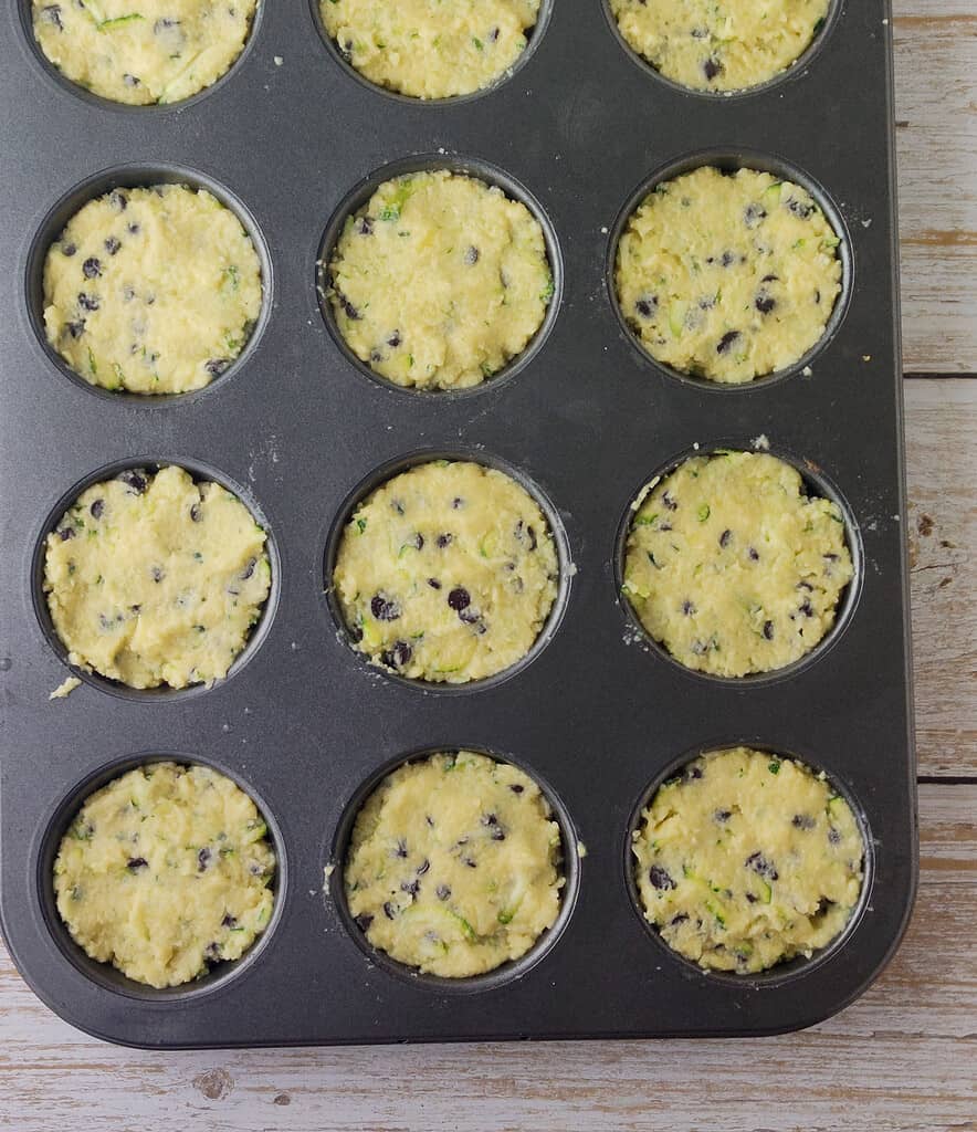 filling the muffin tin tray
