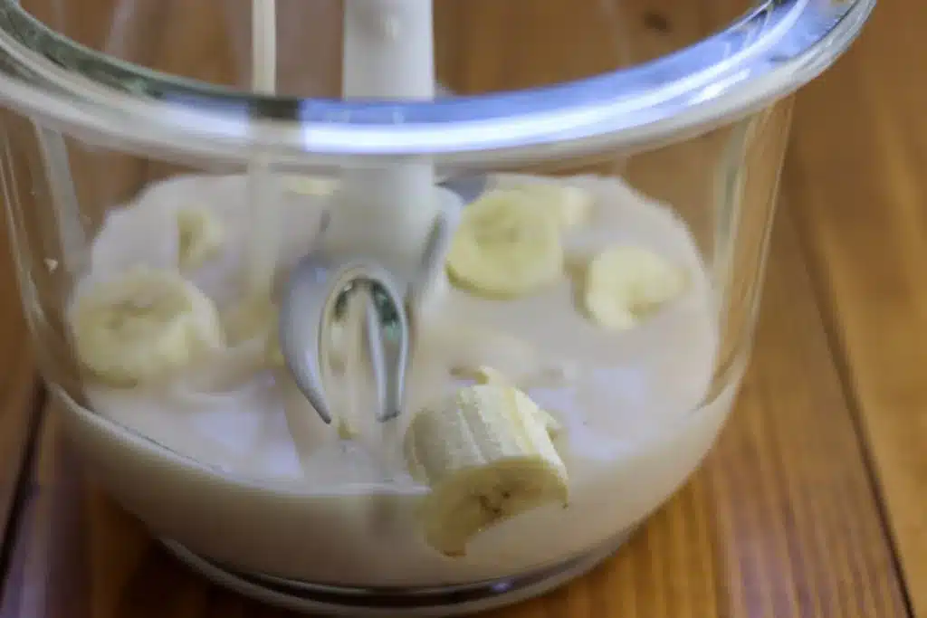 blending a banana 