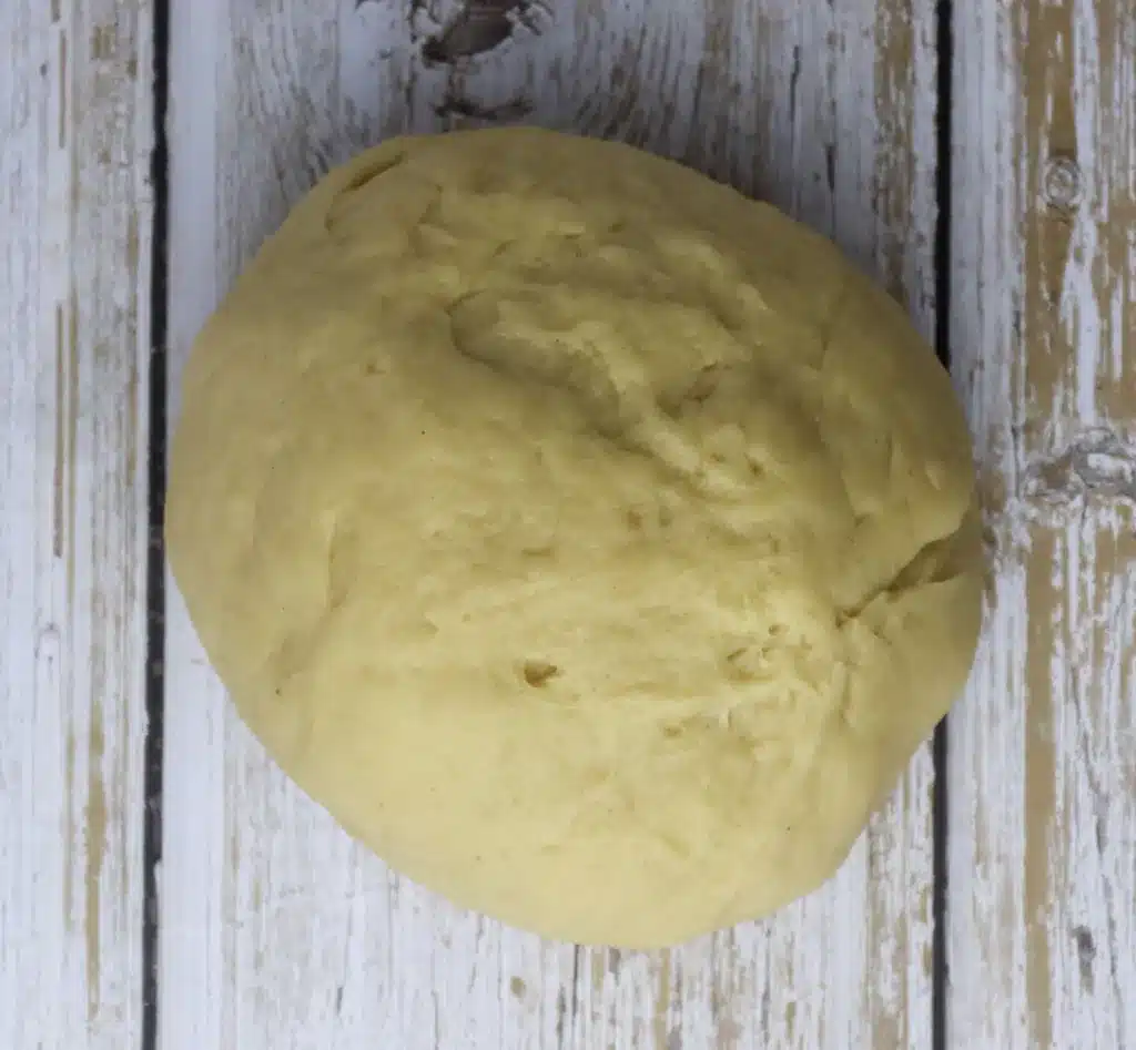 step: image showing how to knead the dough