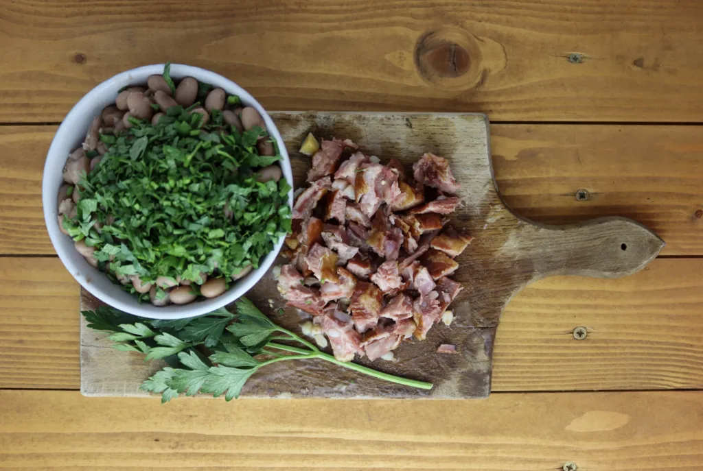 step eight: how to slice pork ribs and chop parsley with beans 