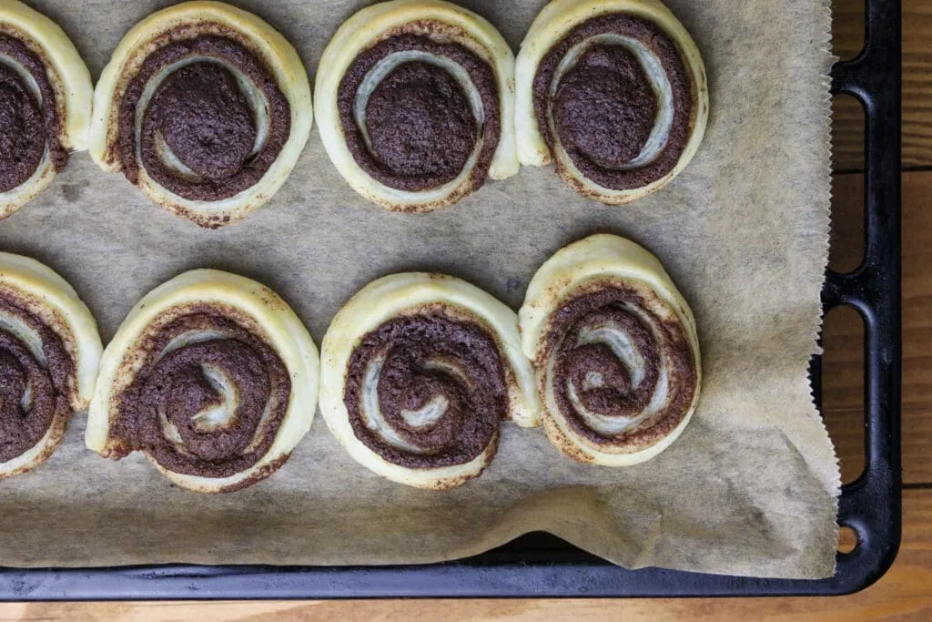 image showing freshly baked cinnamon puff pastry pinwheels 