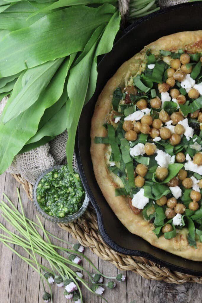image of served wild garlic pizza with roasted chickpeas 