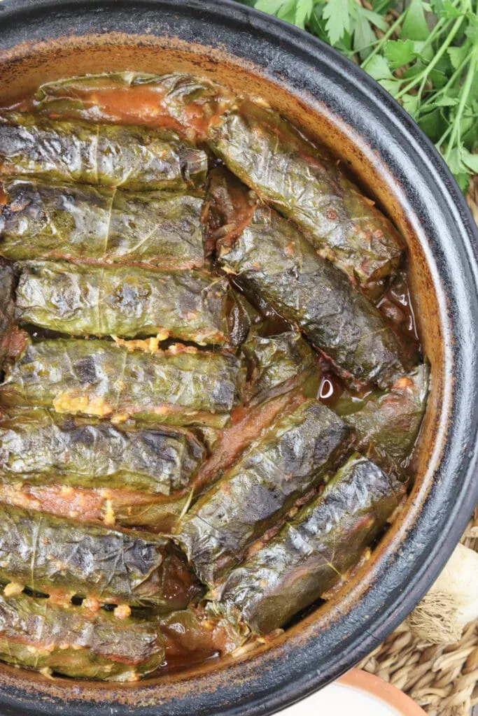 Image of baked japrak - stuffed grape vine leaves righ out of the oven