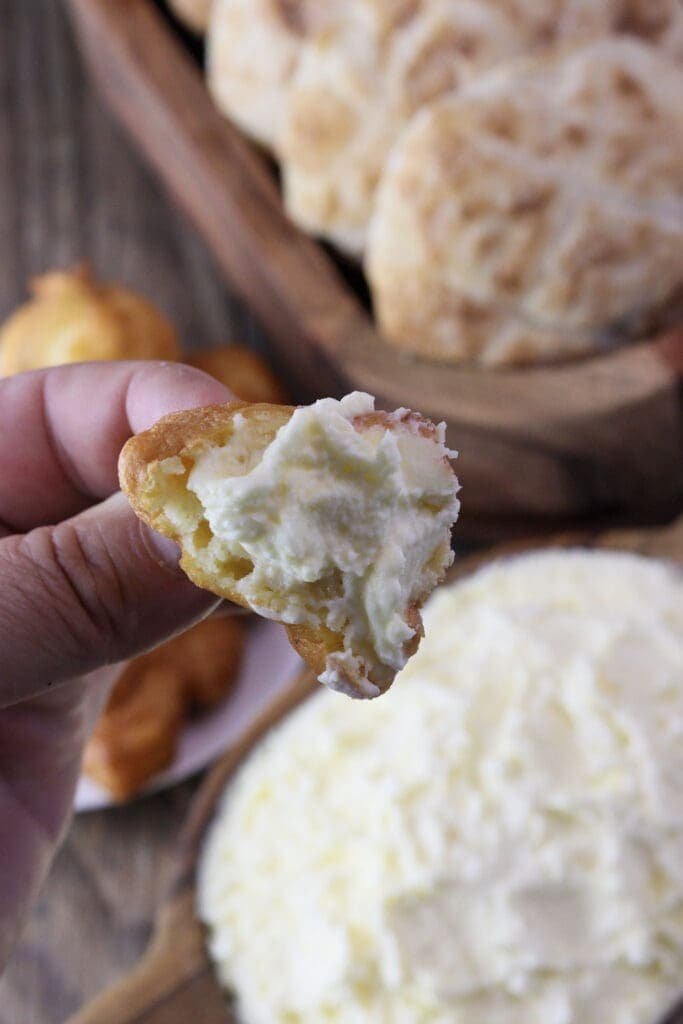 Kajmak on a slice of a fried dough ball