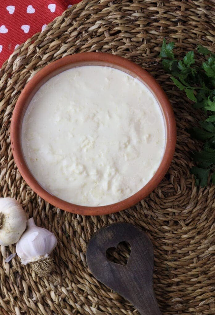 first layers of kajmak in a bowl 