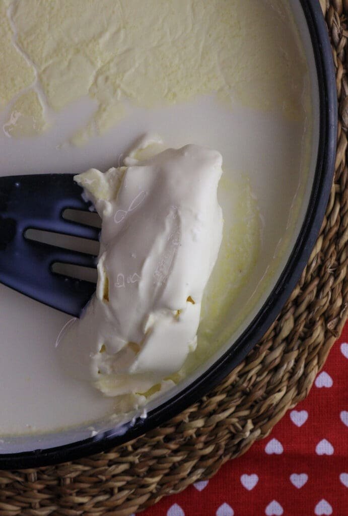 how to remove the kajmak from the  milk 