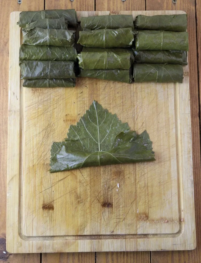 Second image of how to stuff grape vine leaves 
