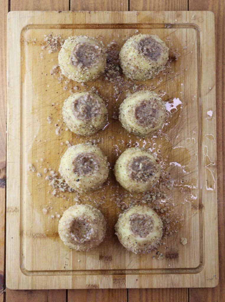 Apples soaking up the sugar syrup. 