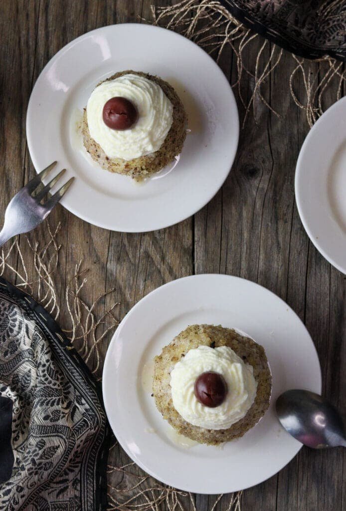 tufahije served on plates with teaspoons