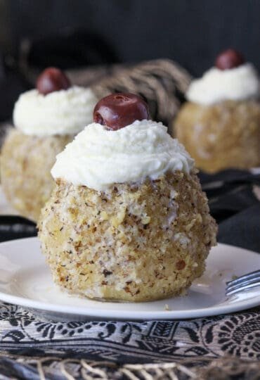 image of served tufahije - bosnian apple dessert with walnuts