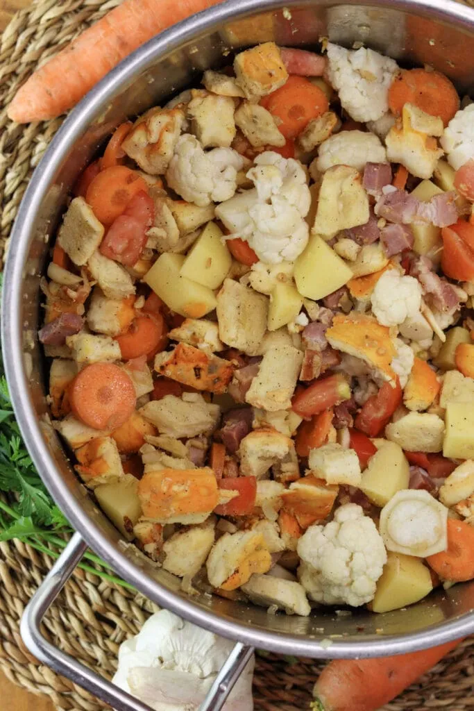 Vegetables added to the chicken of the woods soup.