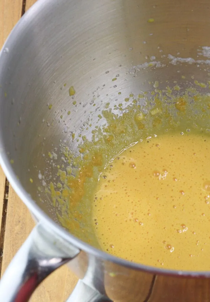 Egg yolks ready to be mixed with cottage cheese.