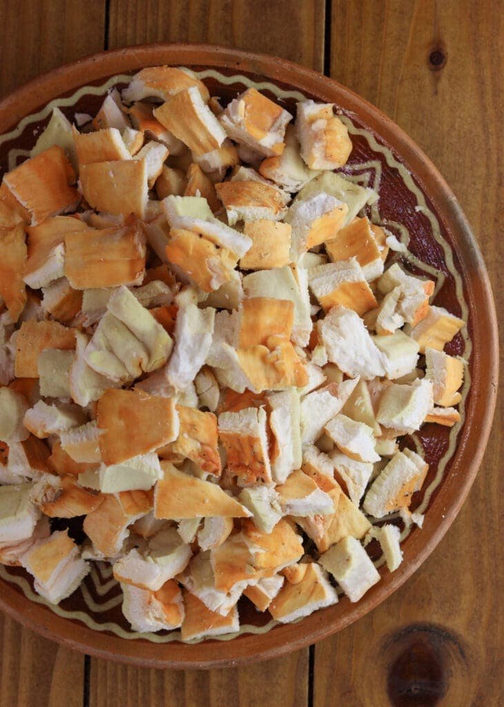 Fresh chicken of the woods mushroom sliced into pieces.