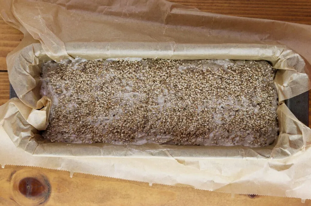 Buckwheat dough sprinkled with sesame seeds.