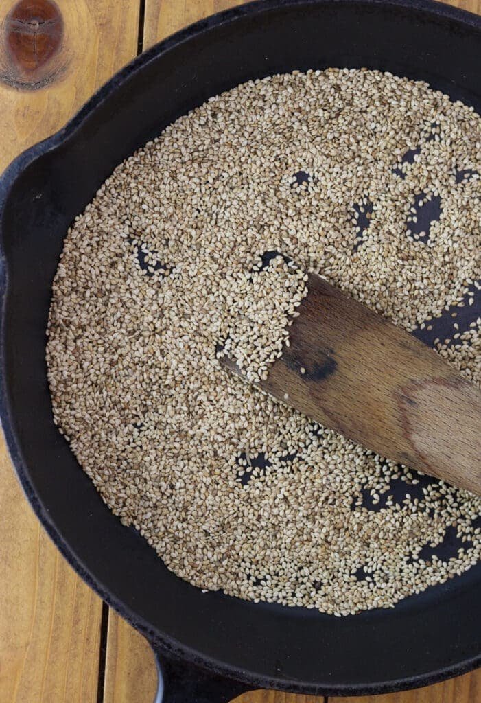 How to toast sesame seeds before adding them to the dough.