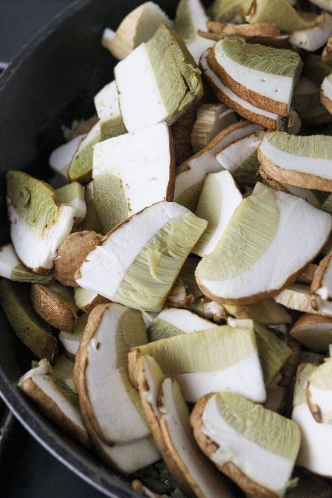 Image showing tasty fresh porcini slices added to a frying pan