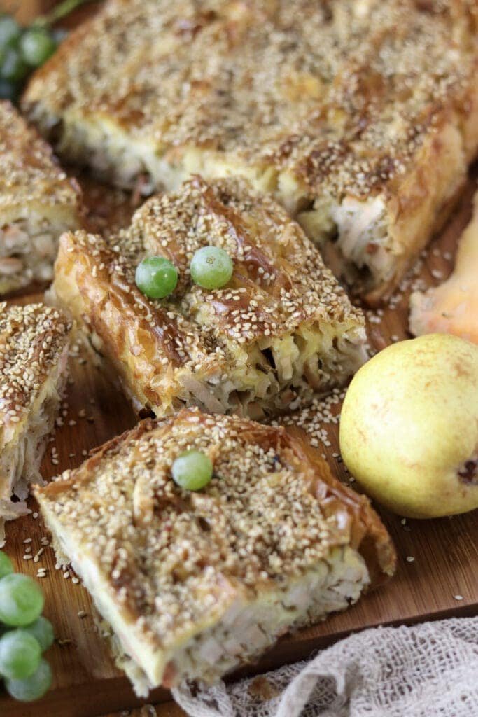 Chicken of the woods recipe - baked crispy phyllo dough pie pieces served on the table.