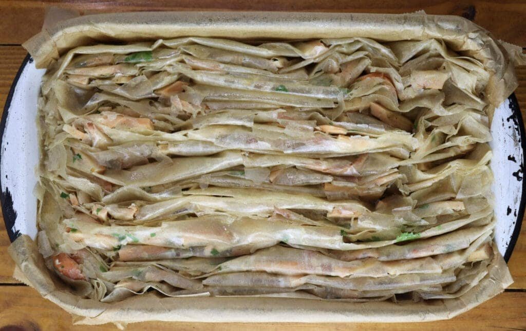 Phyllo dough for chicken of the woods pie in the pan before baking