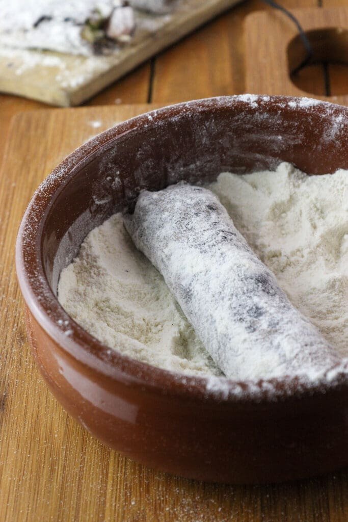 Dusting the rolls with flour first.