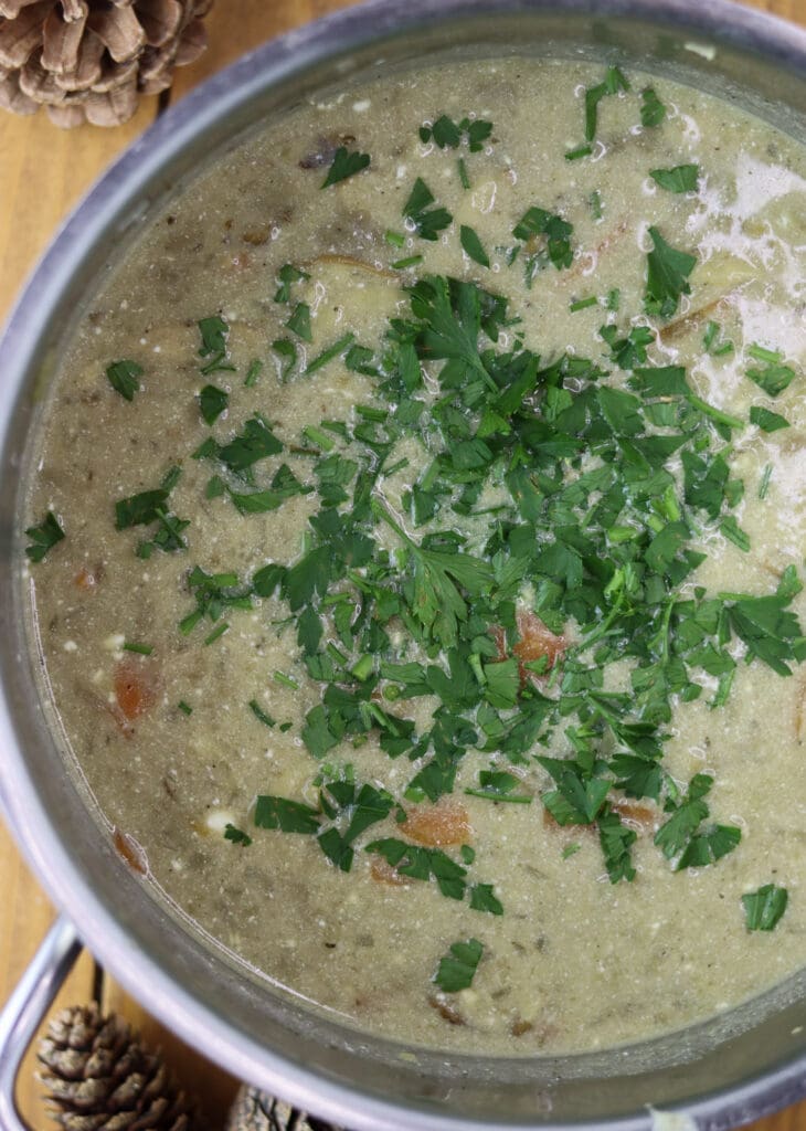 Image showing the soup mixed with sour cream and fresh parsley