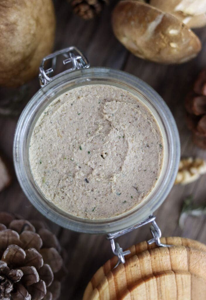 top image of a full jar, filled with freshly made porcini mushroom walnut pate