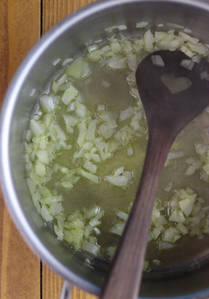How to fry the onions in hot olive oil or lard before cooking the soup.