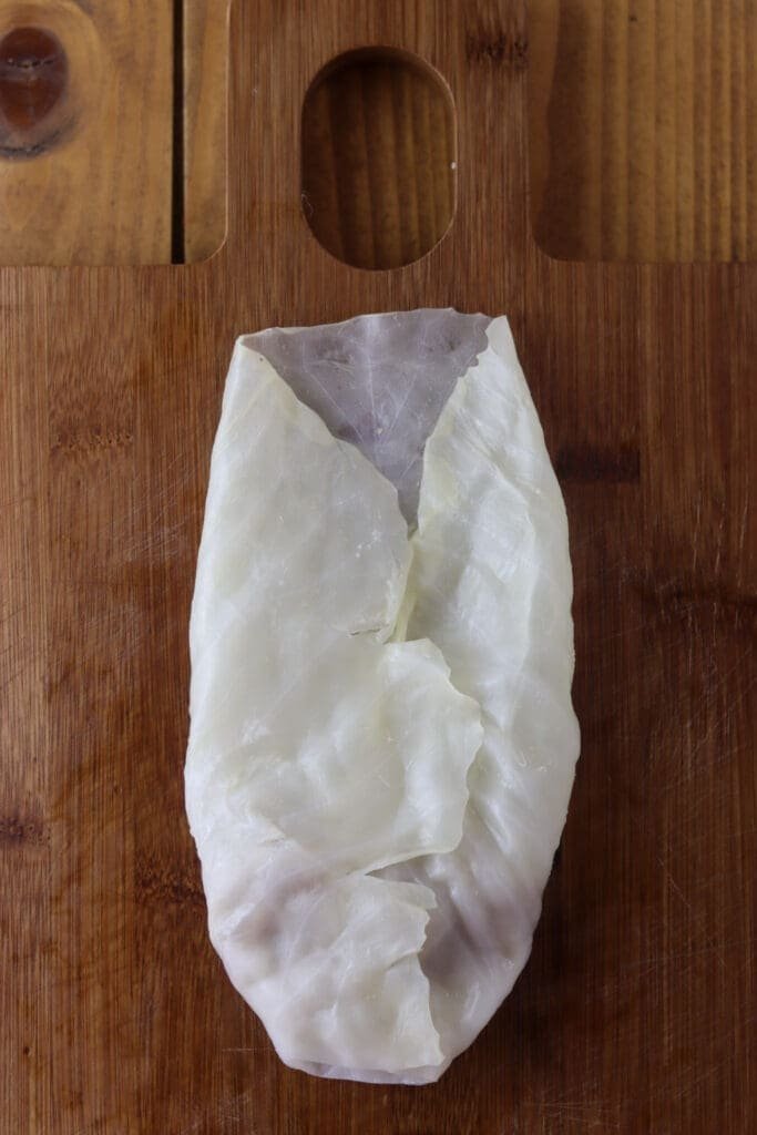 How to stuck the edges of the cabbage leaf to easily roll a cabbage leaf with stuffing into a roll.